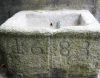 Waschtrog des Stiftsbrunnen aus einem Monolit (Granit) gefertigt